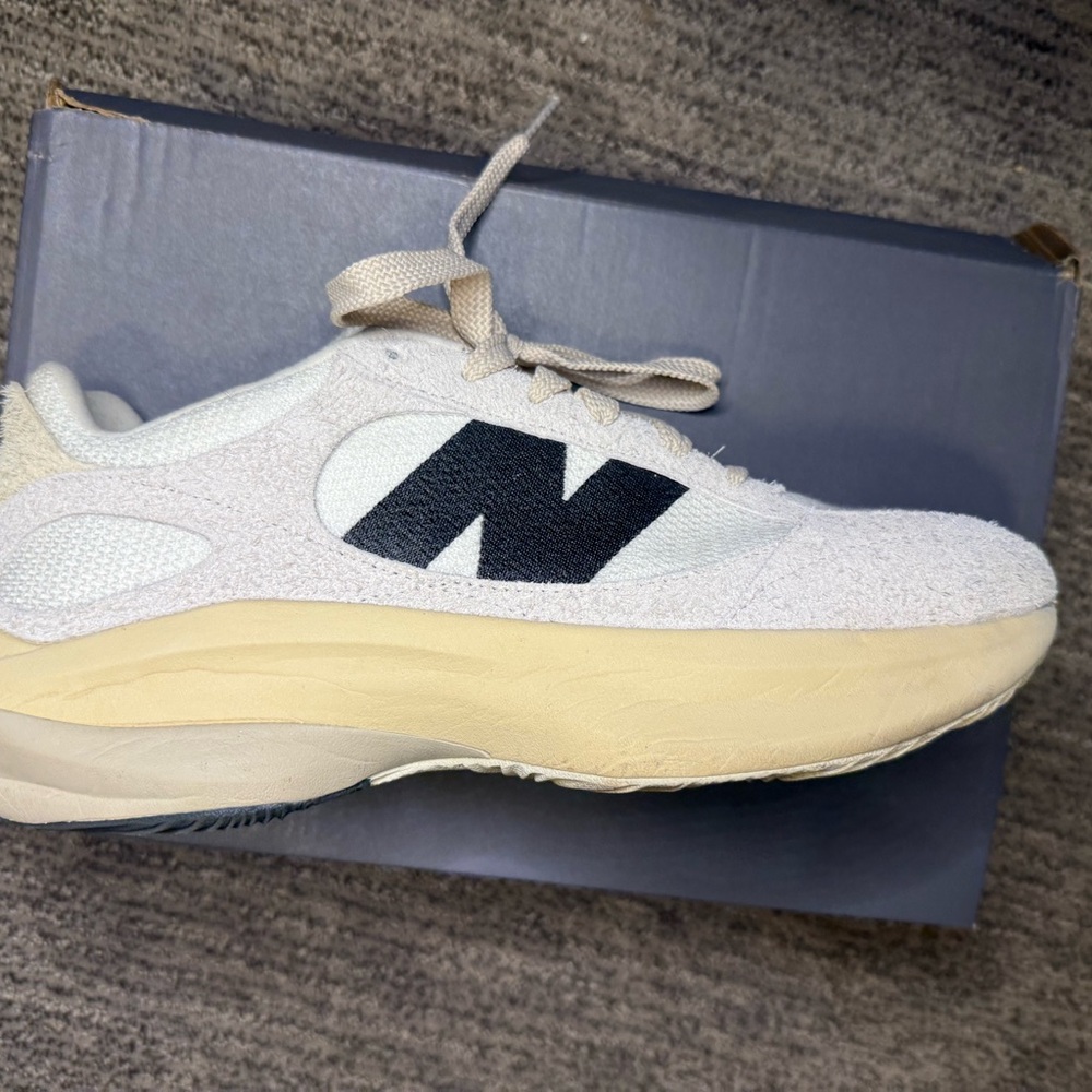 New Balance Cream and Black Athletic Shoes
